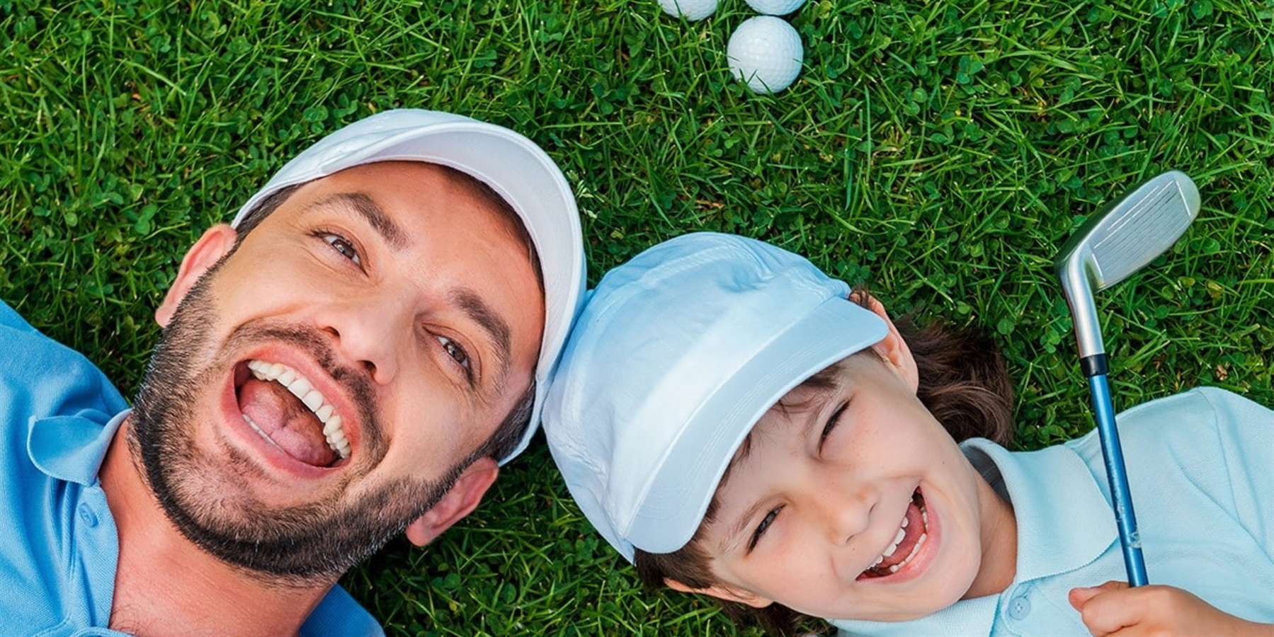 Golfing dad and son